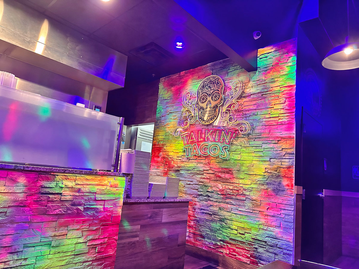 wall with bright neon lights and skull
